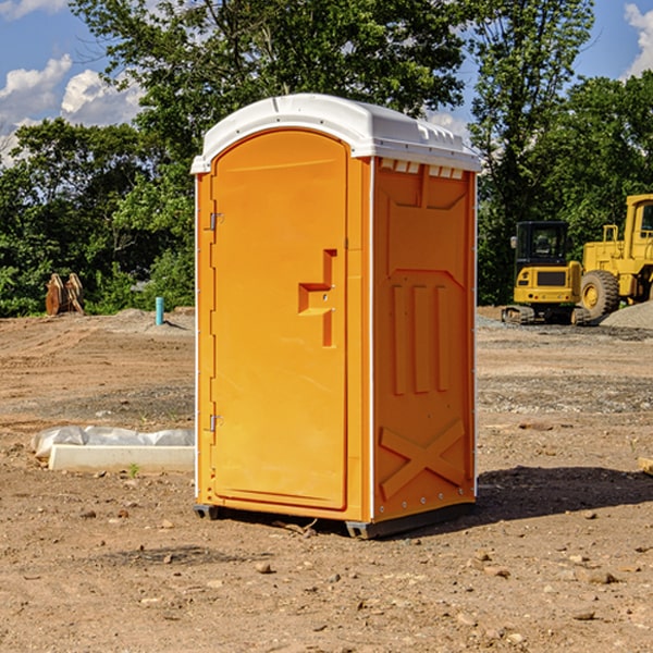 how often are the portable restrooms cleaned and serviced during a rental period in Osterburg